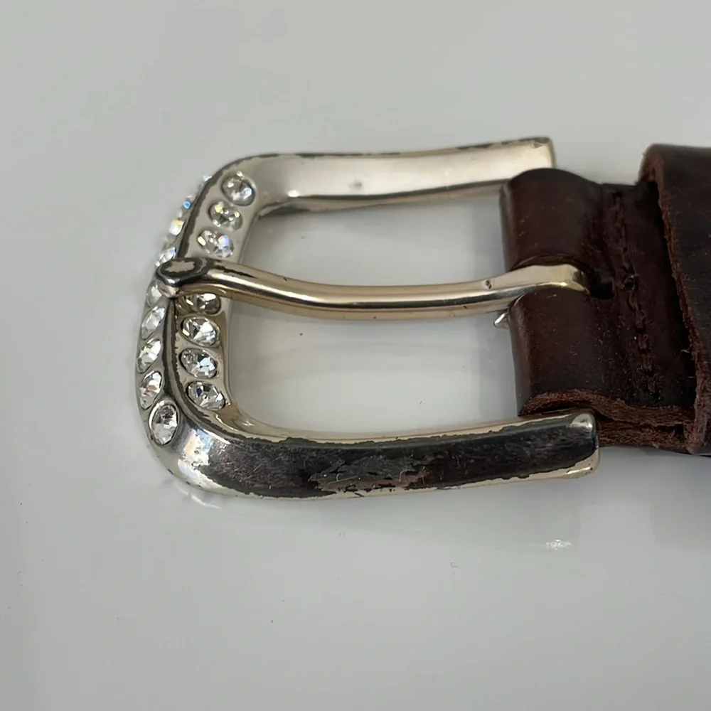 Fossil women’s Medium brown leather‎ belt. Silver buckle with rhinestones. EUC